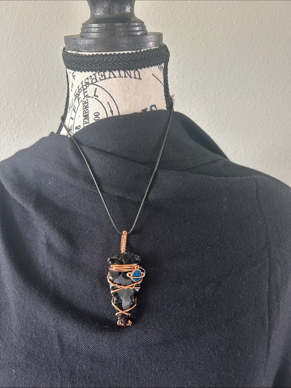 Handcrafted Black Obsidian Arrowhead Pendant with Copper Wire and Blue Accent